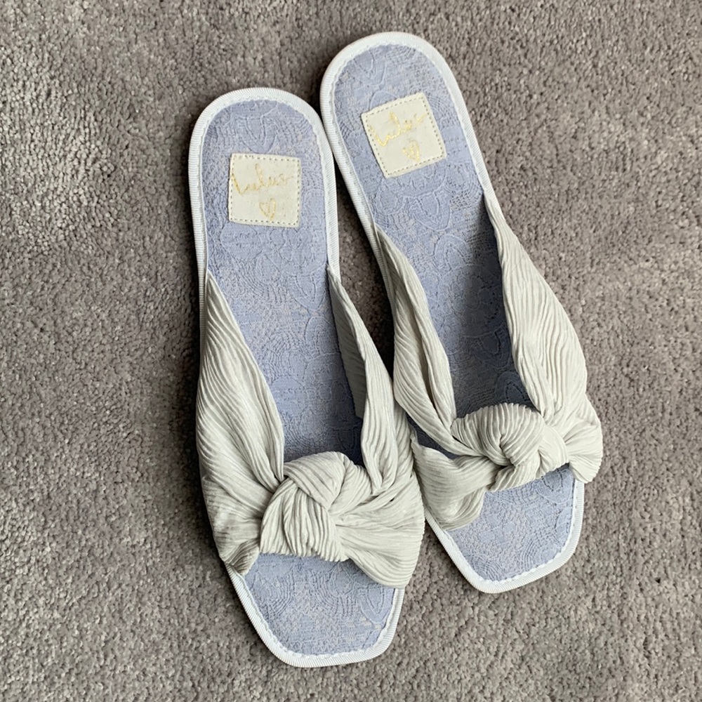 White flat sandals